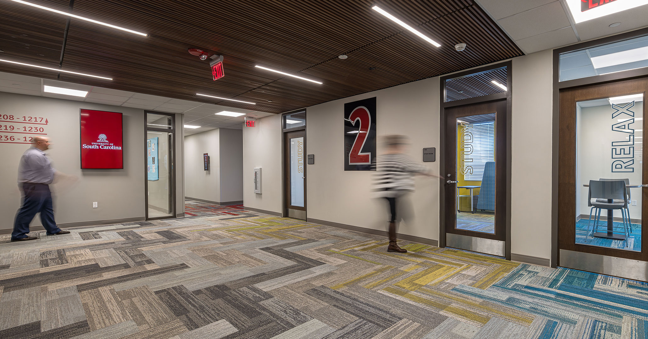 BOUDREAUX designed the floor carpet to color coordinate with the rooms