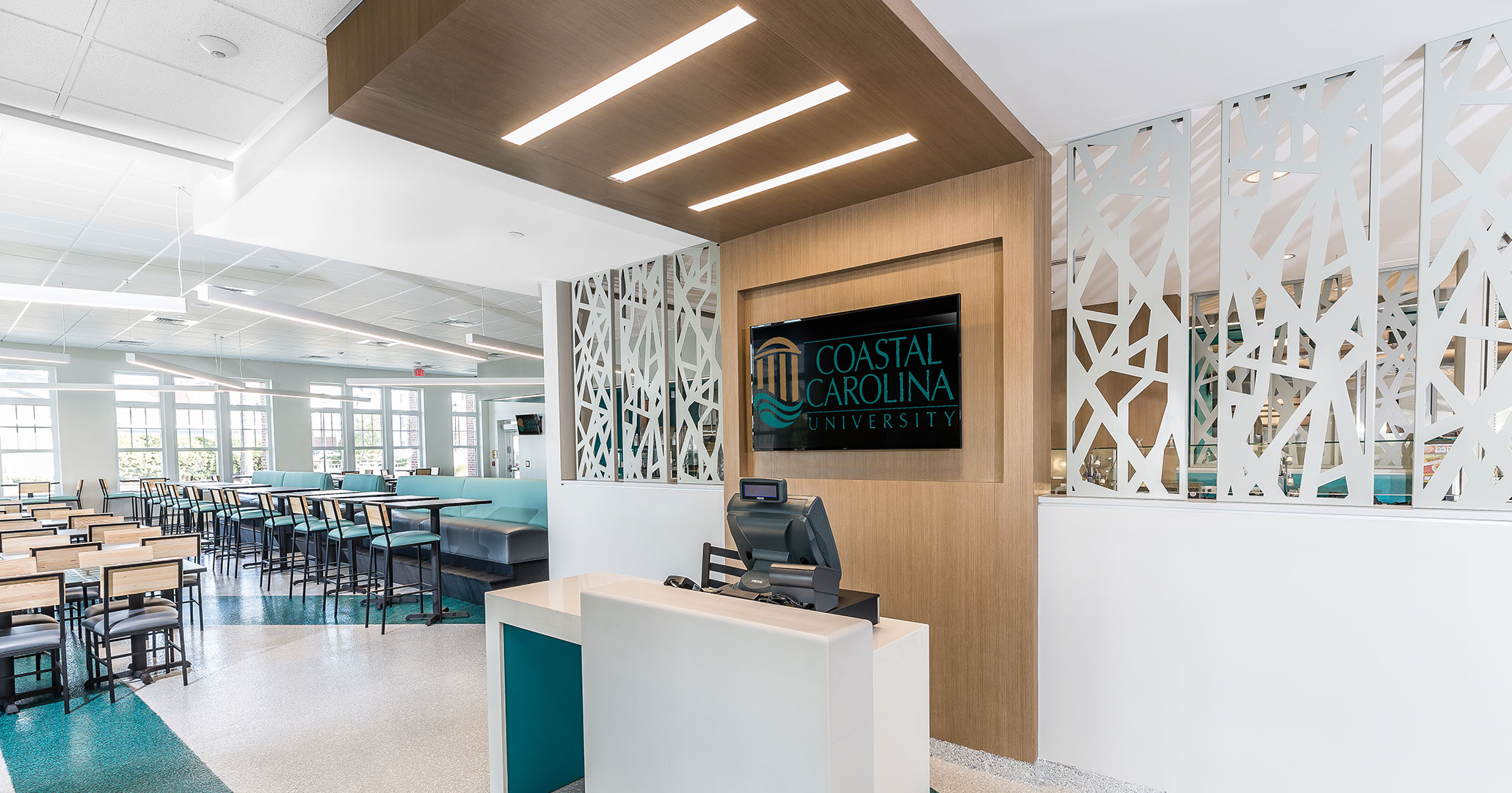 Boudreaux architects designed the modern interior for the college’s new Dining Hall.